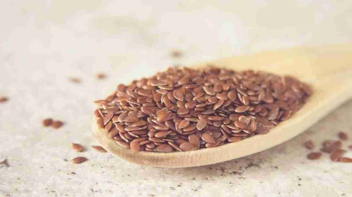 Flax Seeds on a Wooden Spoon