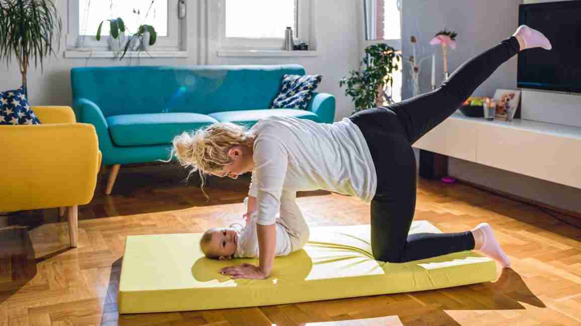 new mother finding balance by exercising at home